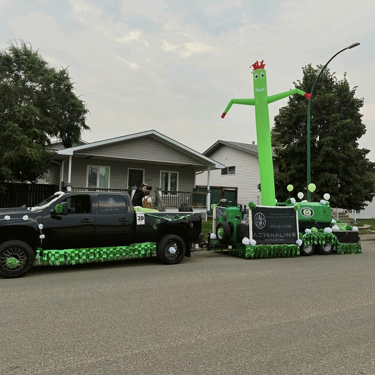 The Adrenaline Eco Blasting truck and blasting trailer staged for the Stampede parade