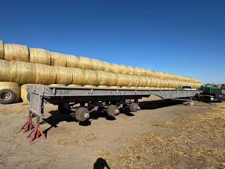Hay trailer on a southeast Alberta farm yard