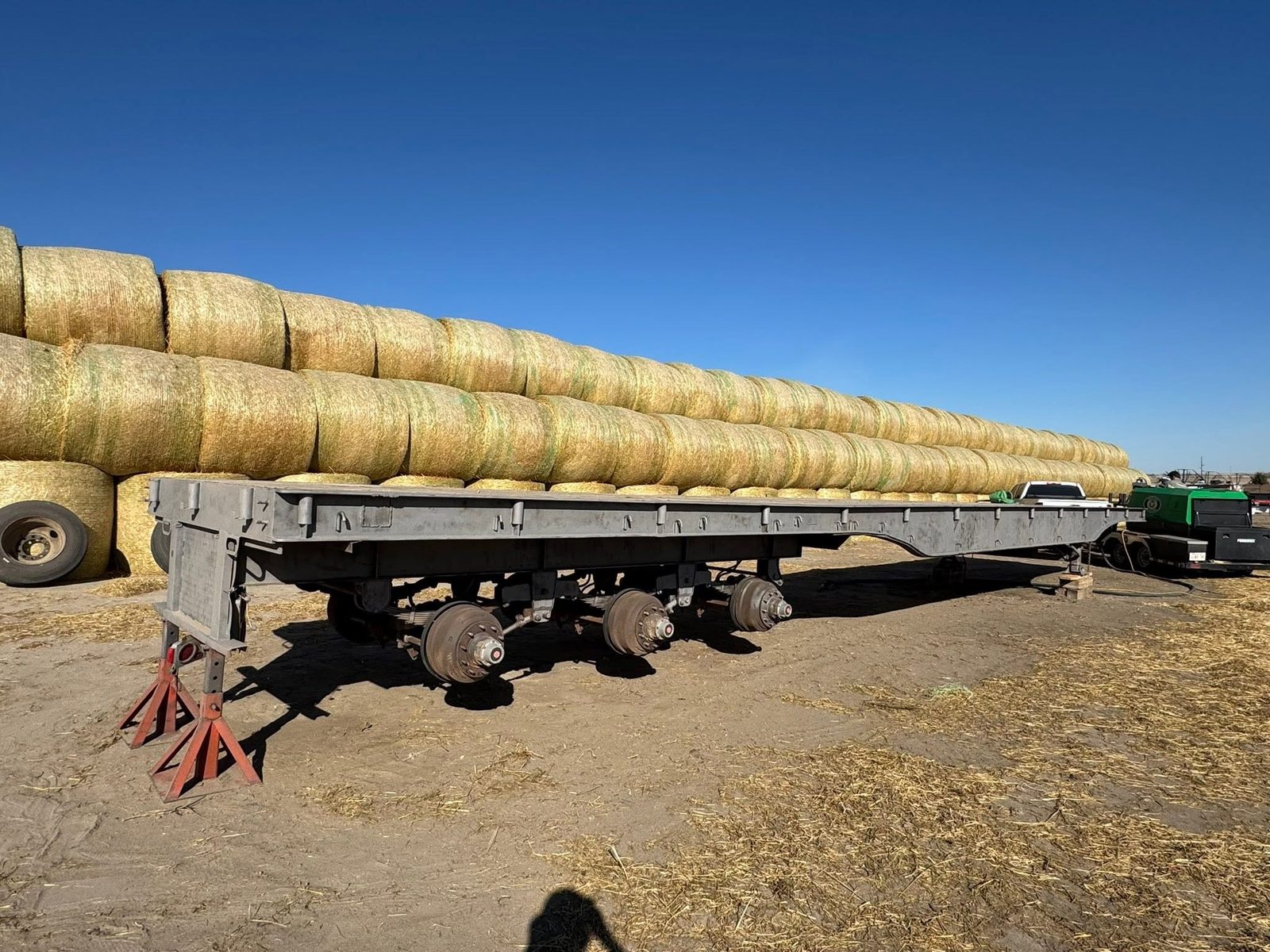 Hay trailer on a southeast Alberta farm yard