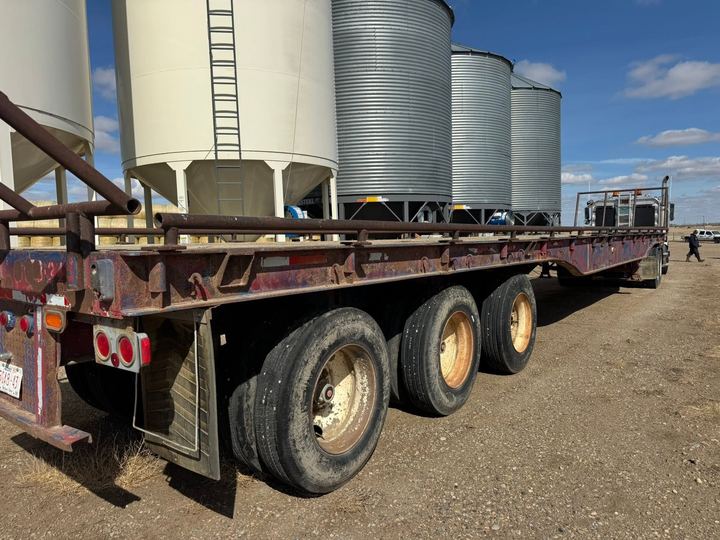 Hay trailer on a southeast Alberta farm yard