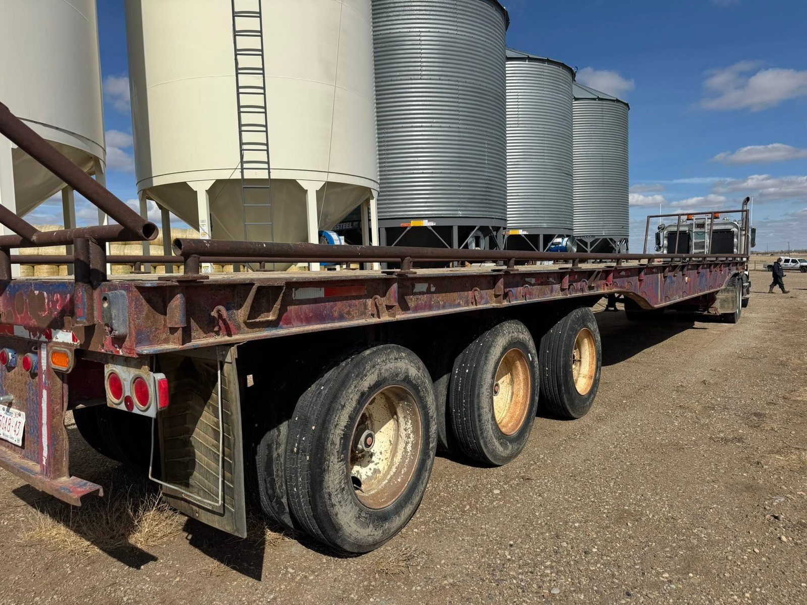 Hay trailer on a southeast Alberta farm yard