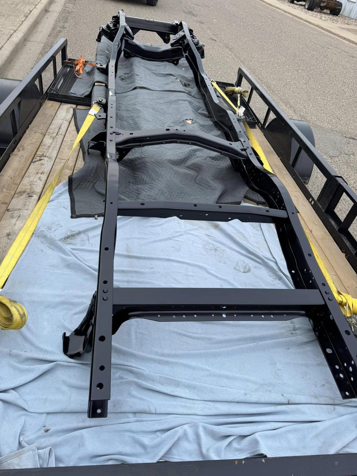 Vehicle frame blasted and coated