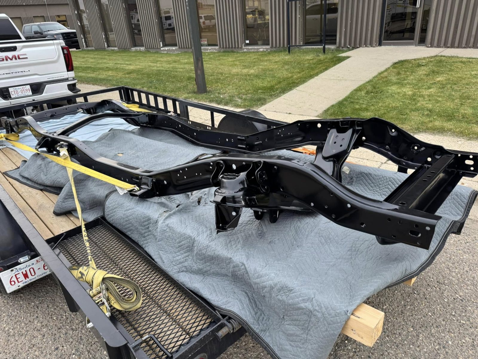 Truck frame blasted to bare metal and coated black