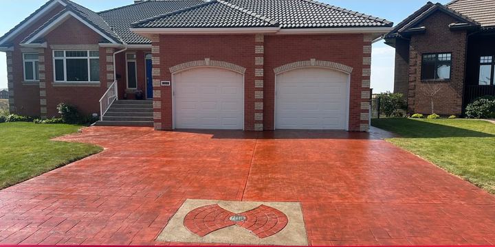 Stamped concrete driveway restored