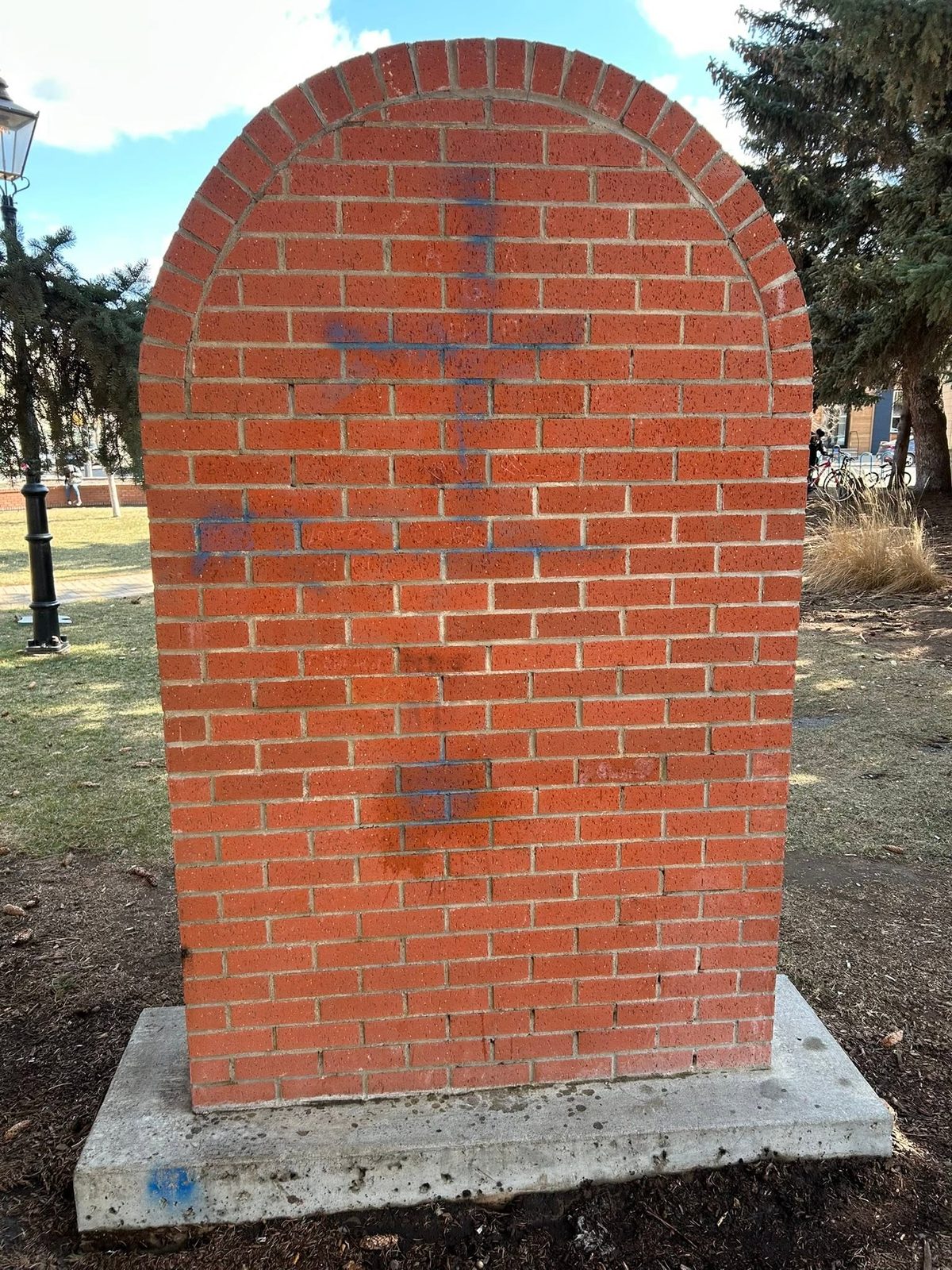 Brick monument after graffiti removal