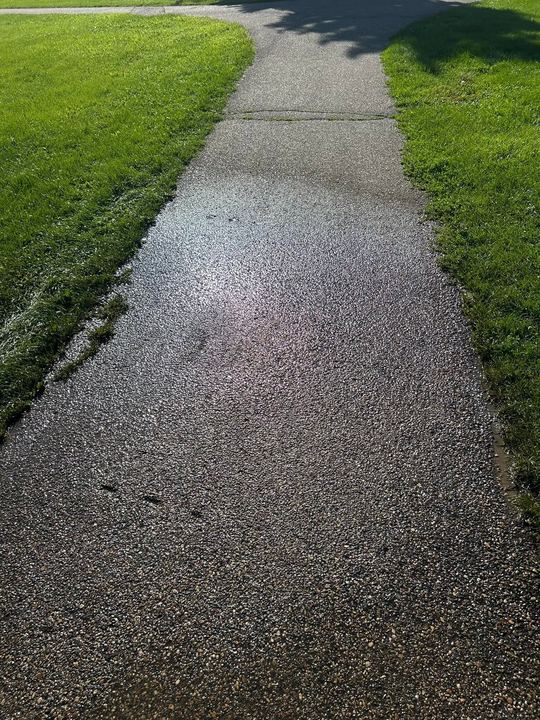 Sidewalk graffiti removed