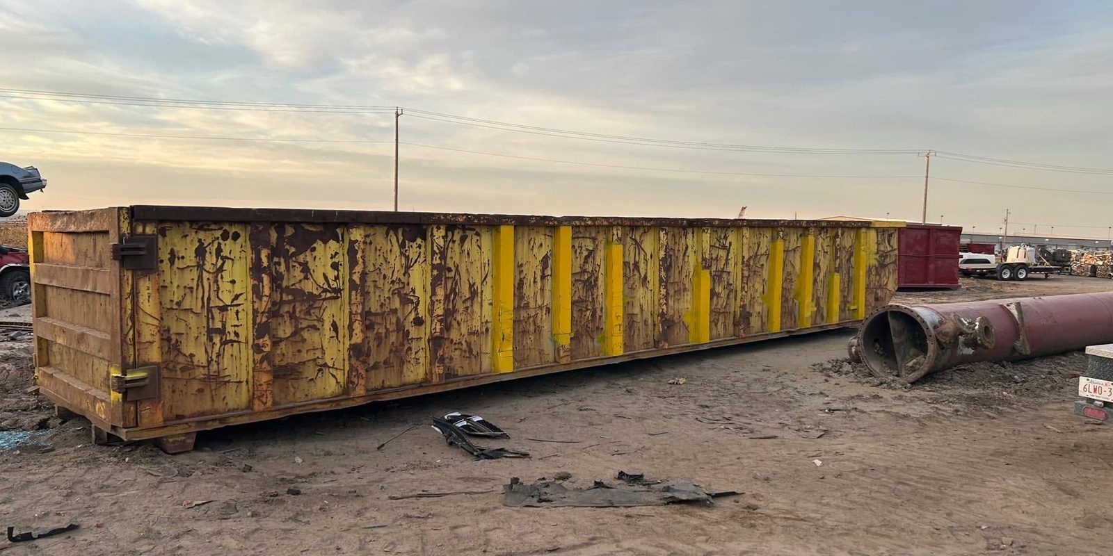 Roll-off waste bin stripped to sound steel
