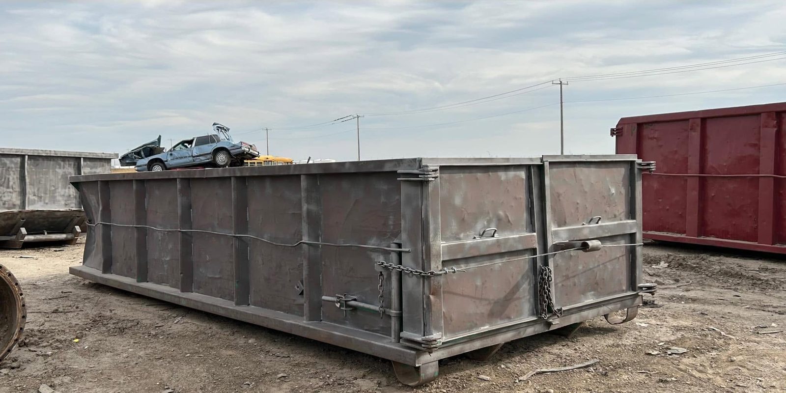 Roll-off waste bin stripped to sound steel