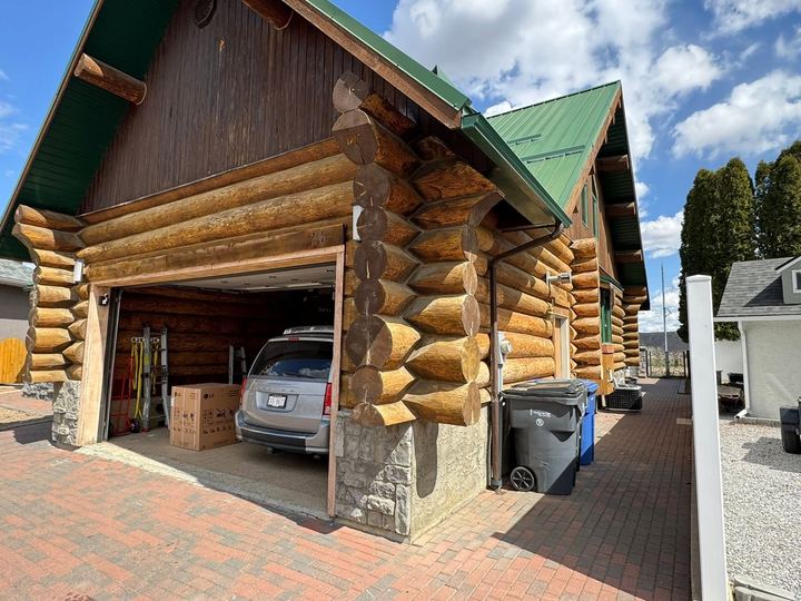 Log home carport before restoration
