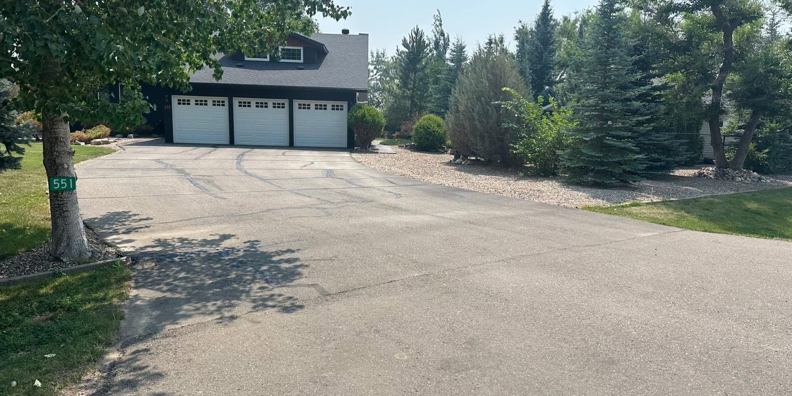 Asphalt driveway cleaned and sealed