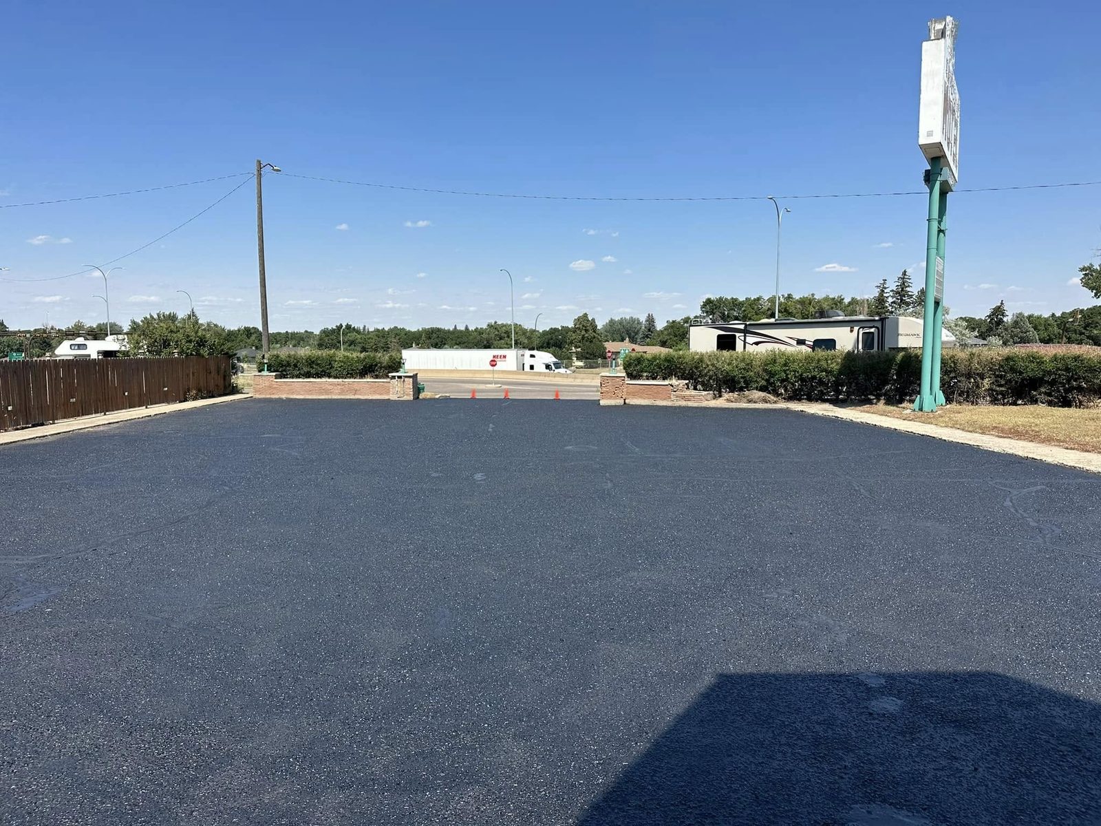 Commercial parking lot cleaned and sealed